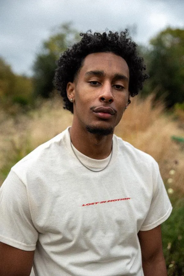 T-Shirt in Neutral With Lost In Motion Logo Print